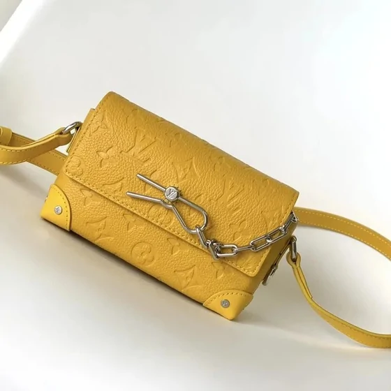 Yellow crossbody bag with a shoulder strap