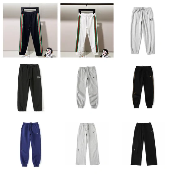 Track trousers in black, gray and navy