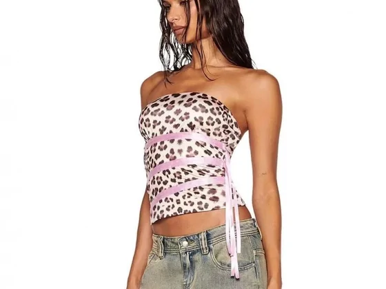 A model wearing a patterned strapless top